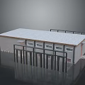 Small Building With Gray Roof Gray Walls Multiple Windows Metal Fence Gate And Stone Foundation