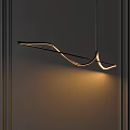 Modern Curved LED Chandelier With Warm Light Hanging In Contemporary Interior Design