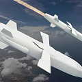 Two White Military Missiles Flying With Smoke Trails Over Cloudy Sky