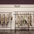 Clothes Rack Displaying Multiple Casual Knitwear And Striped Sweaters In Retail Store