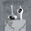 Modern White Decorative Ornament Set with Black Hollow Design on Marble Pedestal and Gray Background