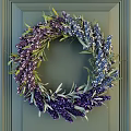 Decorative Hanging Wreath with Purple and Blue Flowers and Green Leaves for Wall Decoration