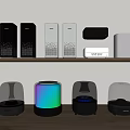 Modern Stylish Headphones And Speakers With Multiple Colors On Shelf