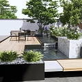 Tranquil Courtyard Garden with Wooden Deck Small Pond Green Plants and Outdoor Dining Set