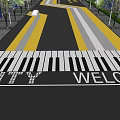 Road Facilities With Piano Keyboard Crosswalk Featuring City Welcome Text And Yellow White Stripes
