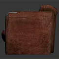Worn Red Two-Seater Sofa with White Tape Patches on Dark Background