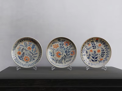 Vintage Ceramic Plates with Floral Patterns in Blue White and Orange on Black Stand 3d model