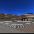 Modern School Building With Red Brick Exterior Green Lawn And Students Playing