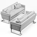 Contemporary Brown Leather Sofa With Decorative Pillows And Metallic Legs