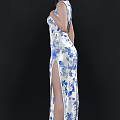 Elegant Woman In Blue And White Floral Cheongsam With Bun Hairstyle On Black Background