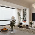 Modern Dining and Living Room Interior With Large Window Green Plants Fireplace and White Sofa