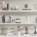 Modern Decorative Ornament Set On Display Shelves With Sculptures Books And Plant Vases