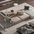 Plush Sectional Sofa in Neutral Tones with Area Rug Floor Lamp and Marble Coffee Tables
