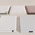 Various Mattresses With Quilted Diamond Patterns And Color Options Displayed