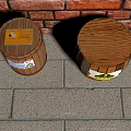 Two Wooden Barrels With Warning Labels Against Red Brick Wall On Stone Pavement