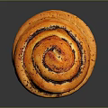 Golden Brown Swirl Baked Pastry Topped With Poppy Seeds On Dark Surface