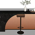 Modern Black Marble Bar Counter With Light Orange Striped Panel Brown Stool Green Plant Decor