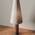 Modern Floor Lamp With Light Fabric Shade And Wooden Base On Wooden Floor