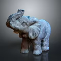 Decorative Elephant Sculpture With Raised Trunk And Detailed Gray Texture