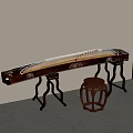 Traditional Chinese Guzheng with Carved Wooden Body Placed Against Wall With Wooden Drum Stool