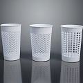 Three White Storage Baskets with Different Hollow Out Patterns for Home Organizing 3d model