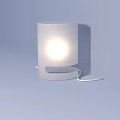 White Minimalist Table Lamp With Cylindrical Illuminated Shade Circular Base And Cord