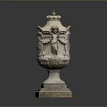 Ornate Carved Stone Vase With Detailed Relief Decorations And Sturdy Square Base
