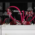 Banquet Hall Decorated For Wedding Party With Pink Floral Decor Chandeliers And Petals