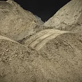 Numerous Soil Mounds Showing Layered Texture And Natural Surface Tracks On Terrain