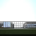 Modern School Building With Glass Facade White Frame And Front Lawn Area