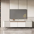 Modern White TV Stand In Living Room With Vase Bookshelf And Decorative Items