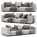 Cozy Gray Two-Seater Sofa with Plush Pillows and Knit Throws Modern Design