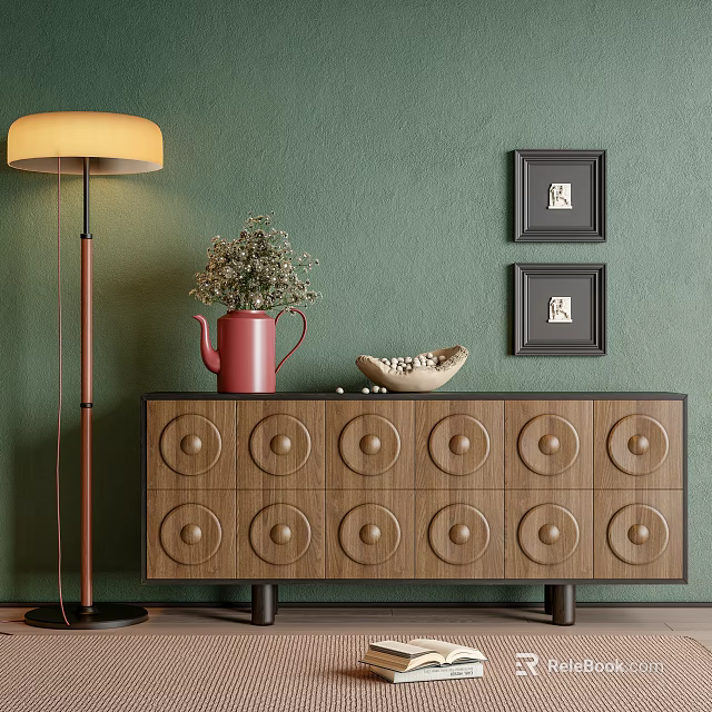 Wooden Console Cabinet With Circular Patterns Against Green Wall Black Frames Red Kettle Shell Decor 3d model