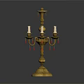 Decorative Brass Candelabra With Multiple Arms White Candles And Crystal Pendants