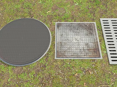 Garden Decorative Drain Covers Featuring Round Square And Slotted Shapes On Grass 3d model