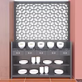 Dark Wood Sideboard With White Bowls Plates And Drawers Against Red Wall Geometric Lattice Screen