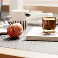 Modern Desk And Office Chair Setup With Laptop Tulips Lamp Stationery Blinds On Wood Floor