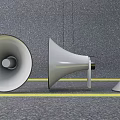 Three Commercial Megaphones Placed on Gray Ground With Yellow Line