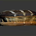 Chocolate Frosted Pastry With White Striped Decoration Light Brown Base And Cream Filling