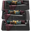 Brown Velvet Two Seater Sofa With Colorful Pillows And Dark Blue Blanket