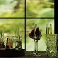 Drinks on Tray with Glasses Bottles Champagne Cups Red Fruits and Window Background