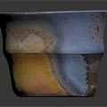 Ceramic Cup With Orange Yellow Gradient And Rustic Textured Surface On Dark Reflective Background