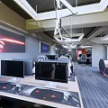 Modern Gaming Internet Cafe Interior With Computers On Desks Wall Art And Ceiling Lighting