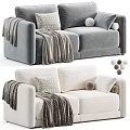Modern Grey And Beige Sofas With Cozy Blankets Decorative Pillows And Round Balls