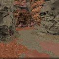 Natural Rocky Crevice With Rough Rock Walls And Scattered Red Sand Pathway