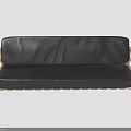 Group of People Relaxing on Black Sofa With Wooden Armrests and Legs