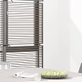 Modern Dining Table Set With Wooden Top Four Black Chairs Magazine And Fruit Bowl