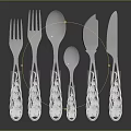 Elegant Silverware Set With Intricate Floral Carved Handles And Mirror Finish