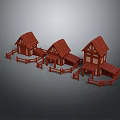 Three Small Wooden Buildings With Red Roofs And Surrounding Wooden Fences