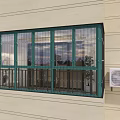 Building Exterior With Green Window Frame And Security Bars And Wall Mounted Air Conditioner Unit